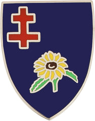 Shield-shaped unit crest with a red cross and yellow flower on a blue background