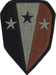 Patch with black, green, and red design featuring stars on a white background