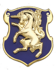 Metal unit crest for the 6th Cavalry Regiment, made of gold metal and blue, with a gold horse in the middle.