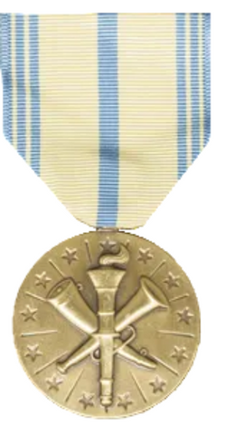 Three military medals with ribbons on a white background