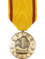 Medal with yellow ribbon and ship emblem on a white background
