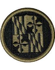 Circular patch with geometric design on a black background