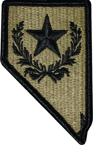 Green patch with star and laurel wreath design embroidered in black