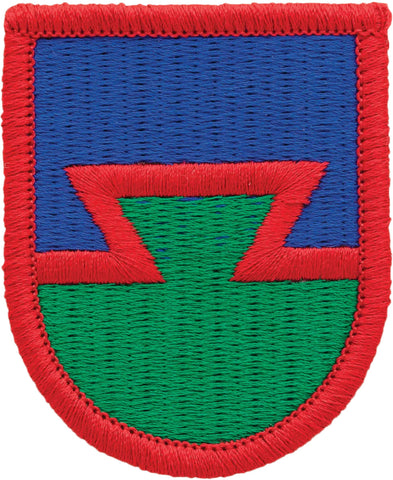 Embroidered patch with red, blue, and green design.
