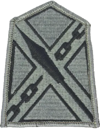 ACU Military patch with a distinctive emblem on a gray background