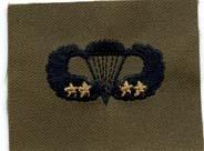 Army Basic Parachutist wing with 4 jumps. Sew on badge in subdued cloth. by Saunders Military Insignia