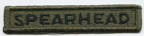 Spearhead tab in green subdued